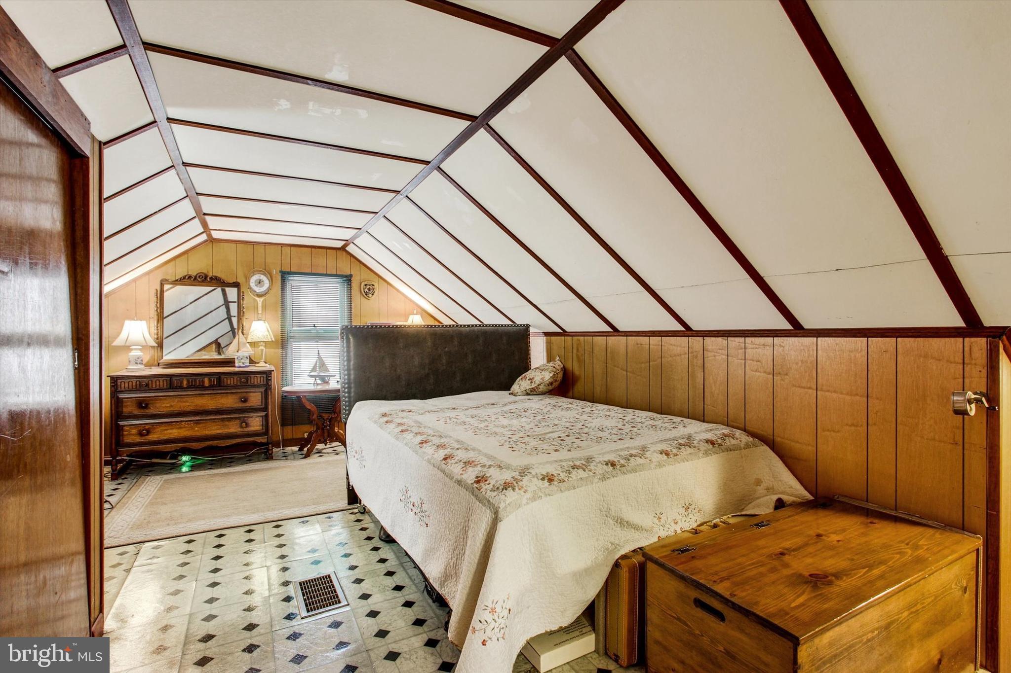 371 Maple Avenue Hanover, PA 17331 - Photo 18 of 24 a bedroom with a bed a dresser next to a window