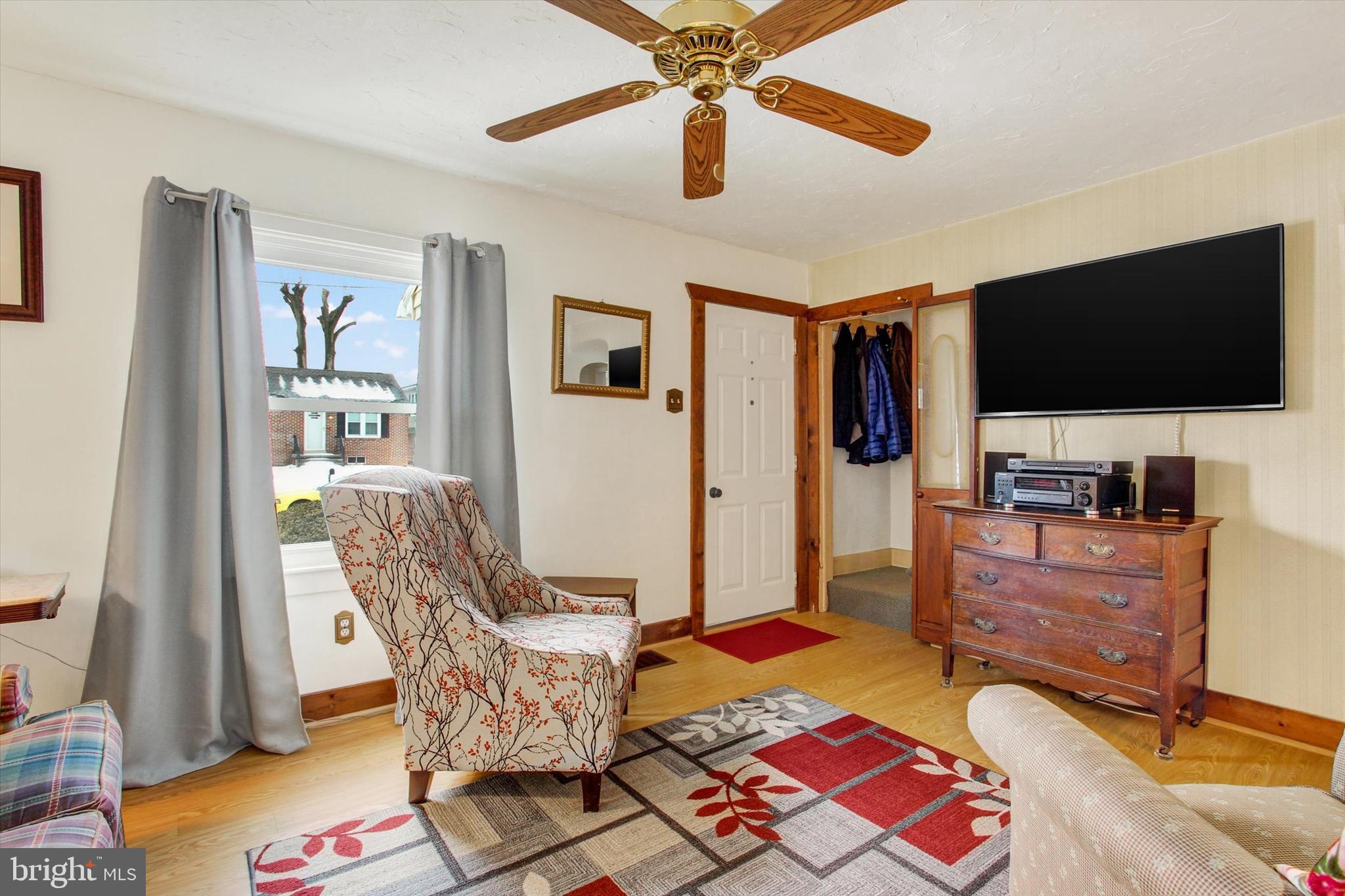 371 Maple Avenue Hanover, PA 17331 - Photo 6 of 24 a living room with furniture and a flat screen tv