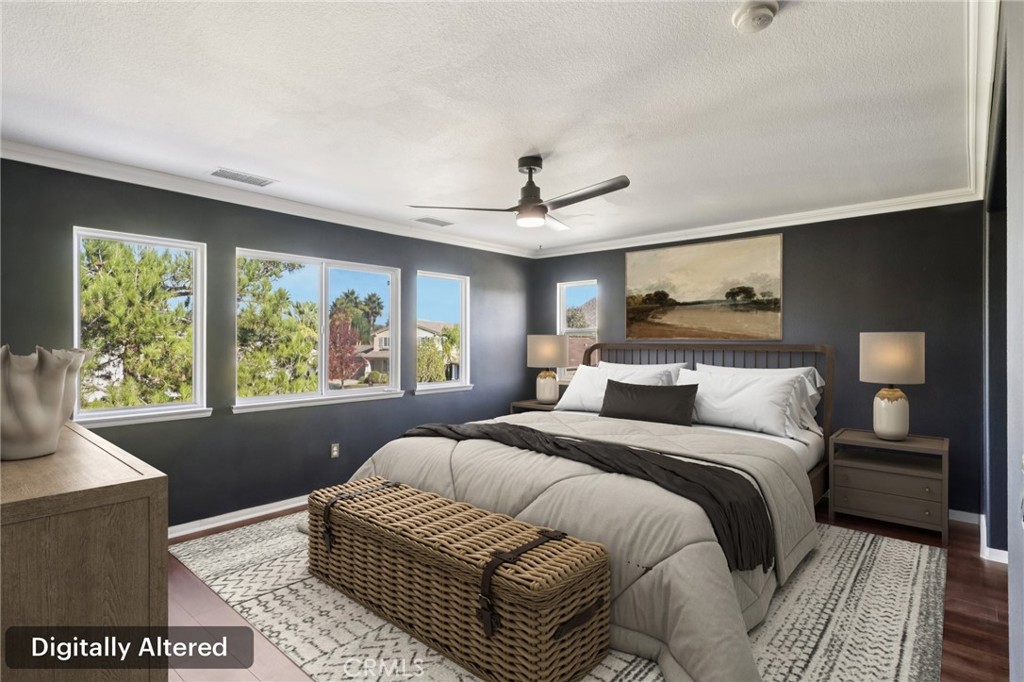 29144 Lighthouse Court Menifee, CA 92585 - Photo 15 of 35 a bedroom with a large bed and a window