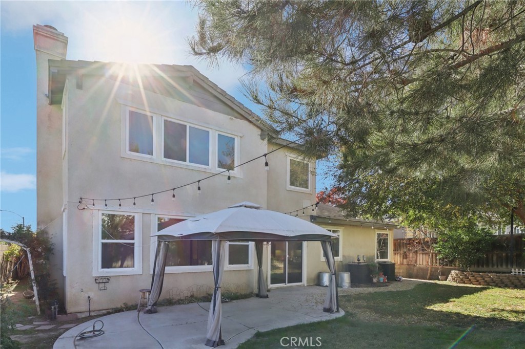 29144 Lighthouse Court Menifee, CA 92585 - Photo 25 of 35 a backyard of a house with seating space
