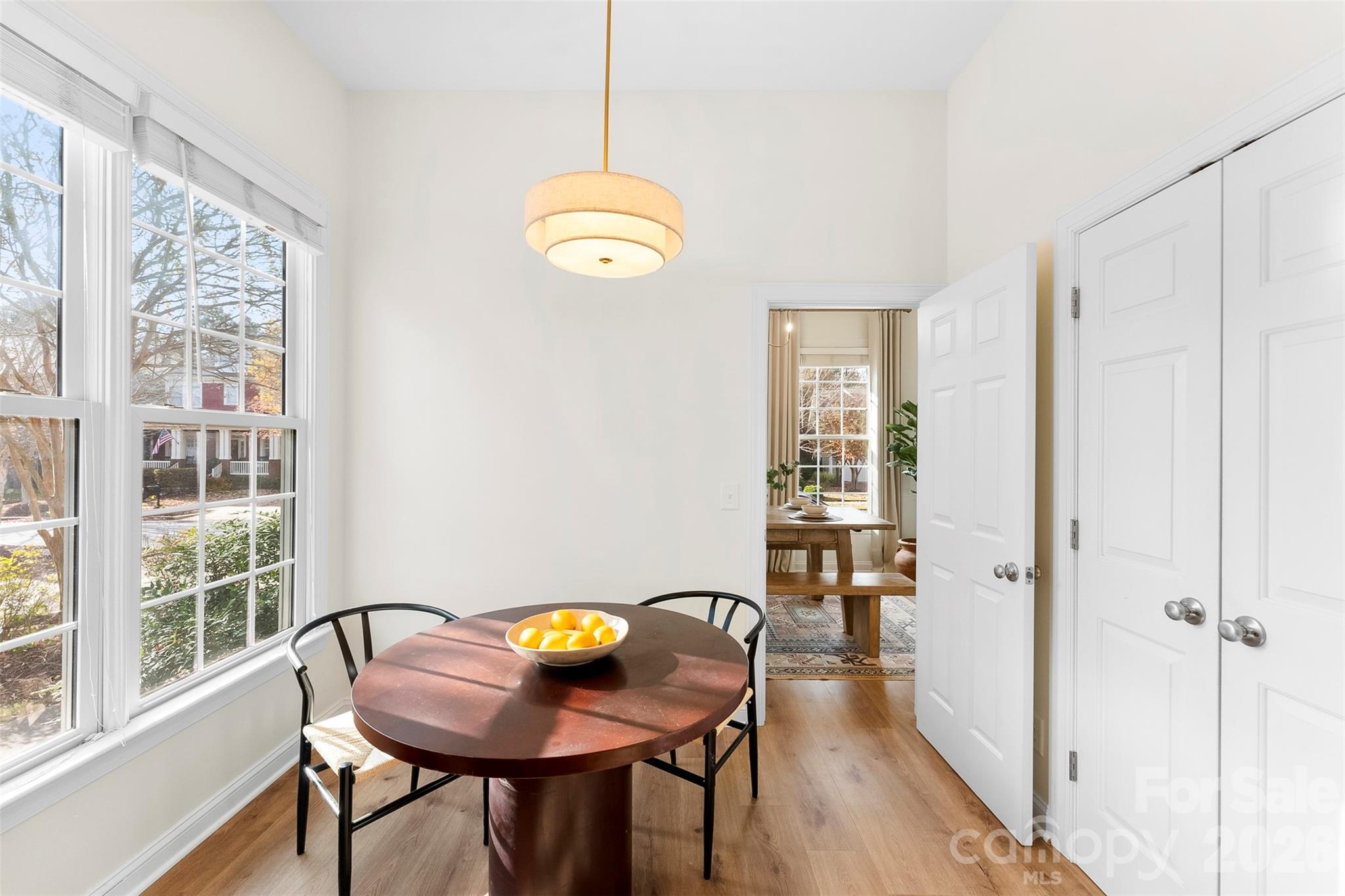 4115 Birkshire Heights Fort Mill, SC 29708 - Photo 13 of 36 a view of a dining room with furniture window and wooden floor