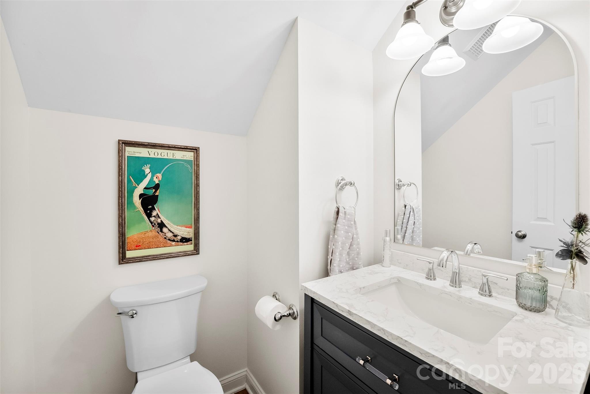 4115 Birkshire Heights Fort Mill, SC 29708 - Photo 20 of 36 a bathroom with a toilet sink and mirror