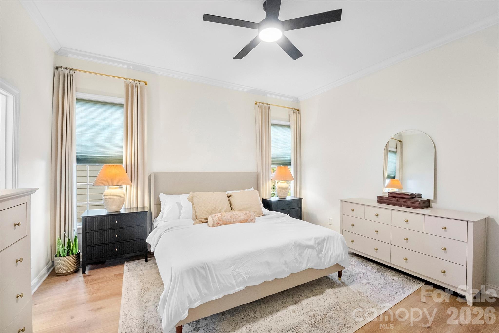 4115 Birkshire Heights Fort Mill, SC 29708 - Photo 22 of 36 a bedroom with a bed and a dresser