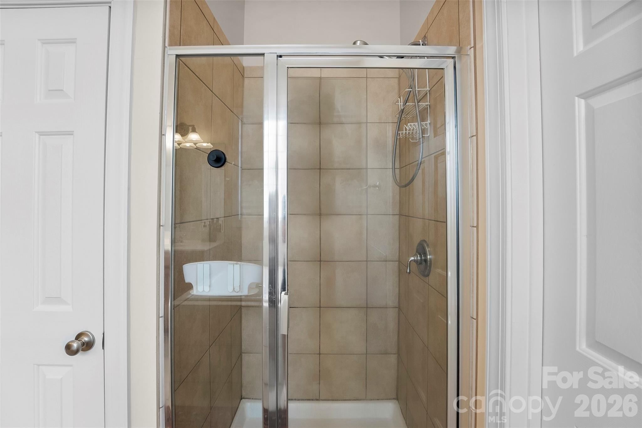 4115 Birkshire Heights Fort Mill, SC 29708 - Photo 27 of 36 a bathroom with a glass shower door