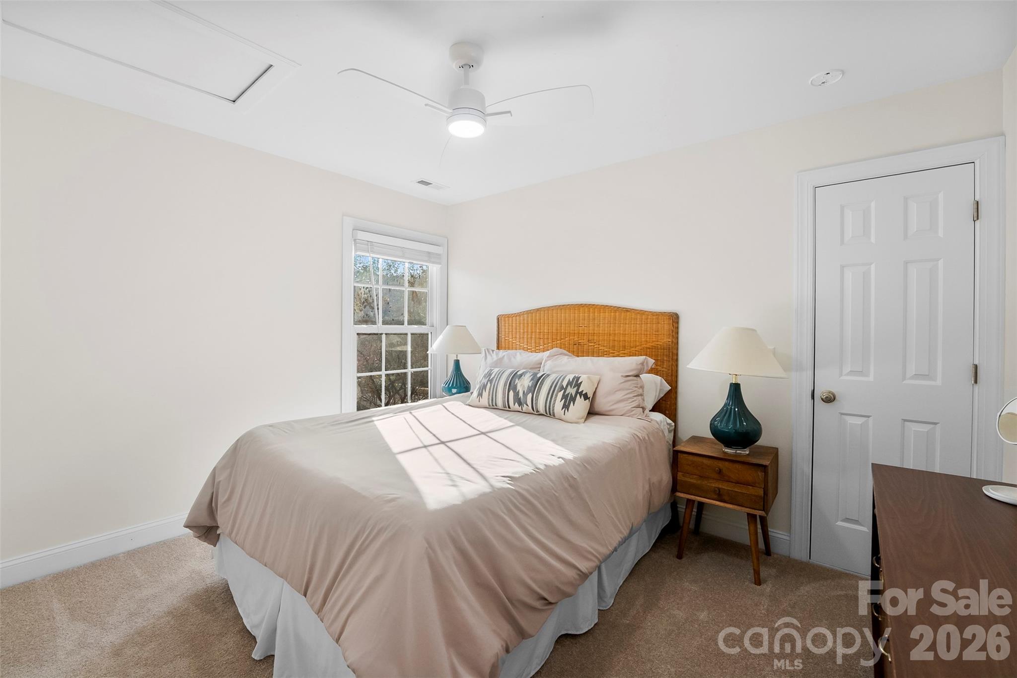 4115 Birkshire Heights Fort Mill, SC 29708 - Photo 30 of 36 a bedroom with a bed and a window