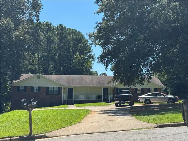 a view of a house with garden