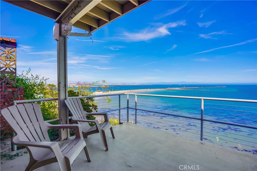 4010 Bluff Place San Pedro, CA 90731 - Photo 19 of 72 a view of balcony with wooden floor and outdoor seating