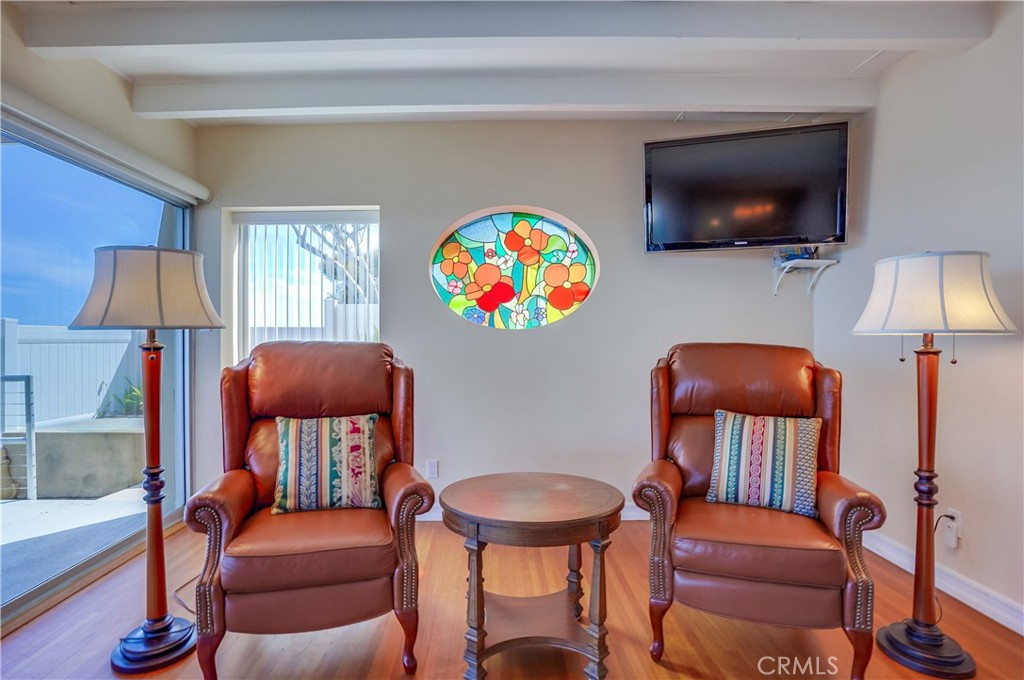 4010 Bluff Place San Pedro, CA 90731 - Photo 36 of 72 a living room with furniture and a flat screen tv