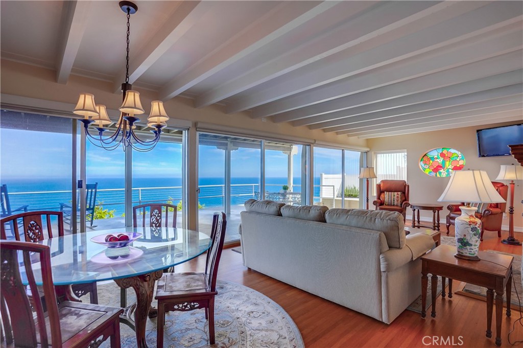 4010 Bluff Place San Pedro, CA 90731 - Photo 38 of 72 a living room with furniture and a floor to ceiling window