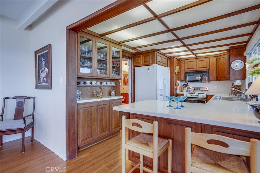 4010 Bluff Place San Pedro, CA 90731 - Photo 39 of 72 a kitchen with a sink appliances and cabinets