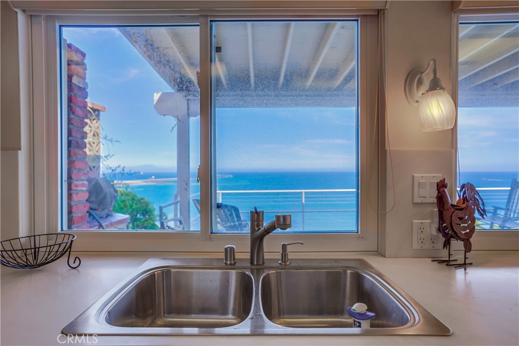 4010 Bluff Place San Pedro, CA 90731 - Photo 42 of 72 a kitchen sink with a granite countertop window