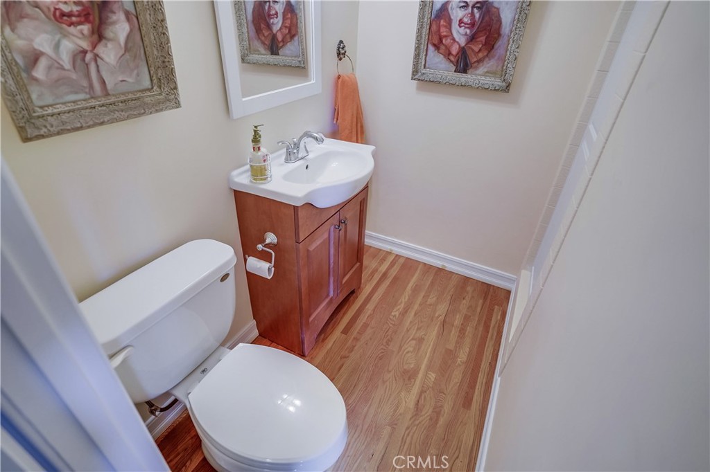 4010 Bluff Place San Pedro, CA 90731 - Photo 43 of 72 a white toilet sitting next to a bathroom sink