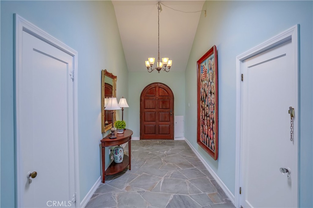 4010 Bluff Place San Pedro, CA 90731 - Photo 5 of 72 a view of a hallway with windows and chandelier