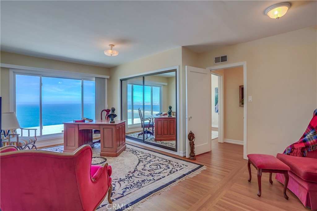4010 Bluff Place San Pedro, CA 90731 - Photo 56 of 72 a living room with furniture a rug and a window