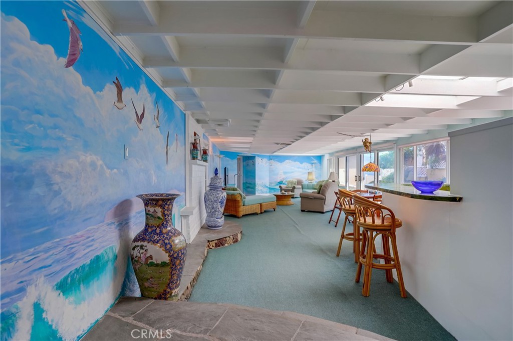 4010 Bluff Place San Pedro, CA 90731 - Photo 6 of 72 a living room with furniture and a chandelier