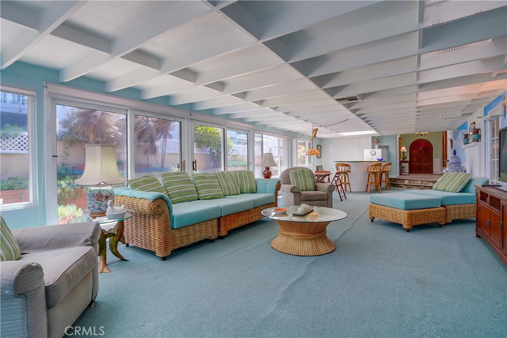 4010 Bluff Place San Pedro, CA 90731 - Photo 10 of 72 a living room with furniture and a chandelier
