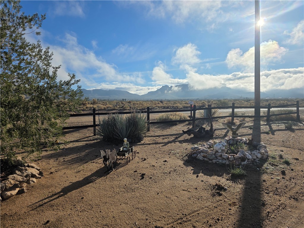 3325 Bacobi Road Golden Valley, AZ 86413 - Photo 5 of 44 View of yard featuring a view of rural / pastoral area and a mountain view