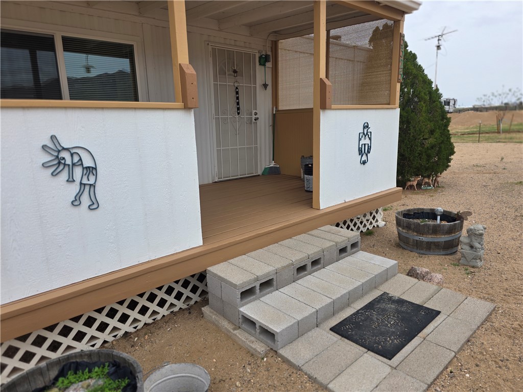 3325 Bacobi Road Golden Valley, AZ 86413 - Photo 9 of 44 View of front porch/patio.