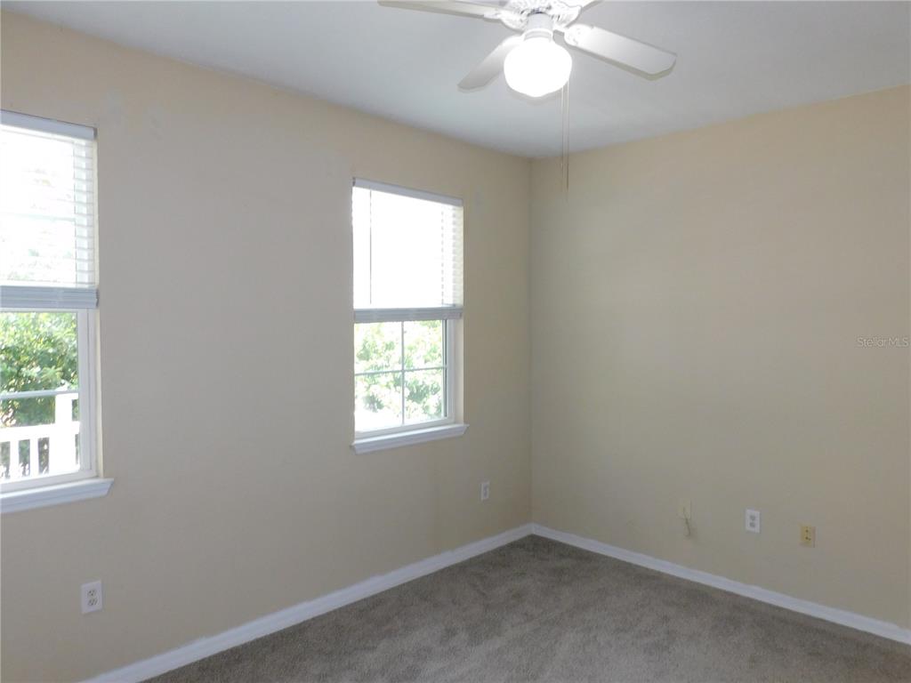 3480 Soho Street, Unit 101 Orlando, FL 32835 - Photo 21 of 29 an empty room with a window