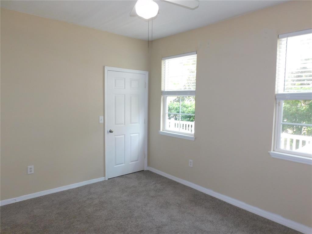 3480 Soho Street, Unit 101 Orlando, FL 32835 - Photo 22 of 29 an empty room with a window