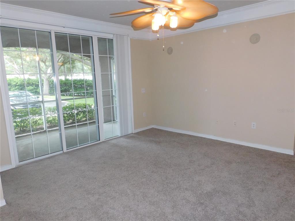3480 Soho Street, Unit 101 Orlando, FL 32835 - Photo 10 of 29 a view of a room with a large window