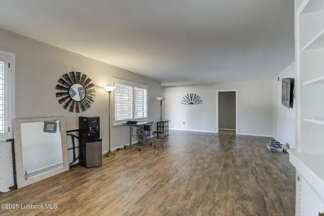 a bathroom with a sink and mirror with toilet
