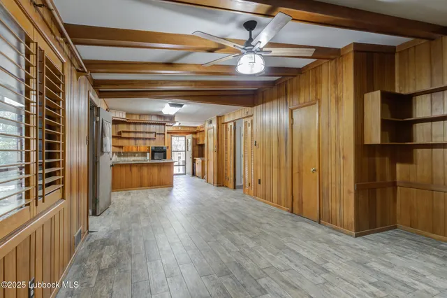 a kitchen with stainless steel appliances granite countertop a sink and cabinets