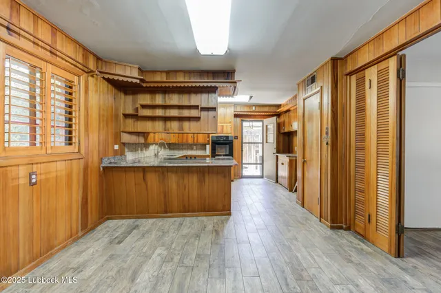 a view of livingroom with wooden floor