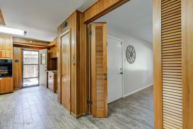 a bathroom with a shower and a sink