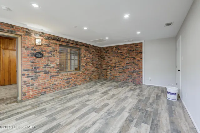 a view of a yard with patio