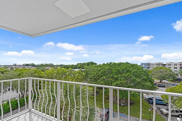 a balcony with an outdoor space