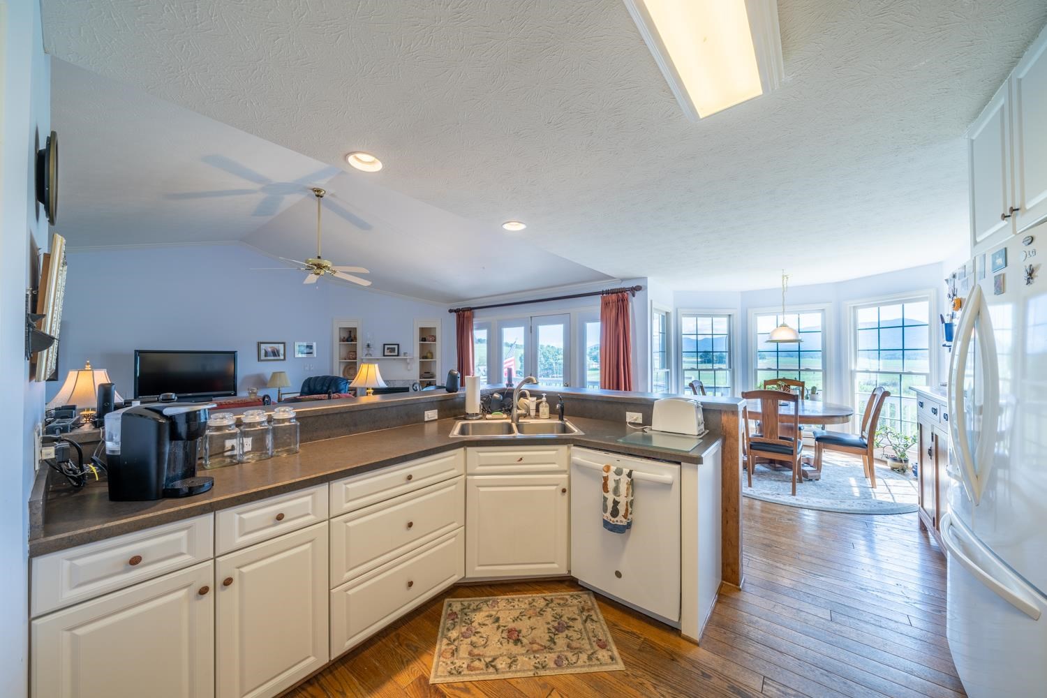 3751 Rockfish Road Grottoes, VA 24441 - Photo 15 of 60 a kitchen with stainless steel appliances granite countertop a stove and cabinets
