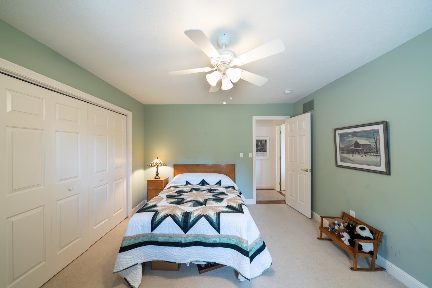 3751 Rockfish Road Grottoes, VA 24441 - Photo 27 of 60 a bedroom with a bed and a chandelier
