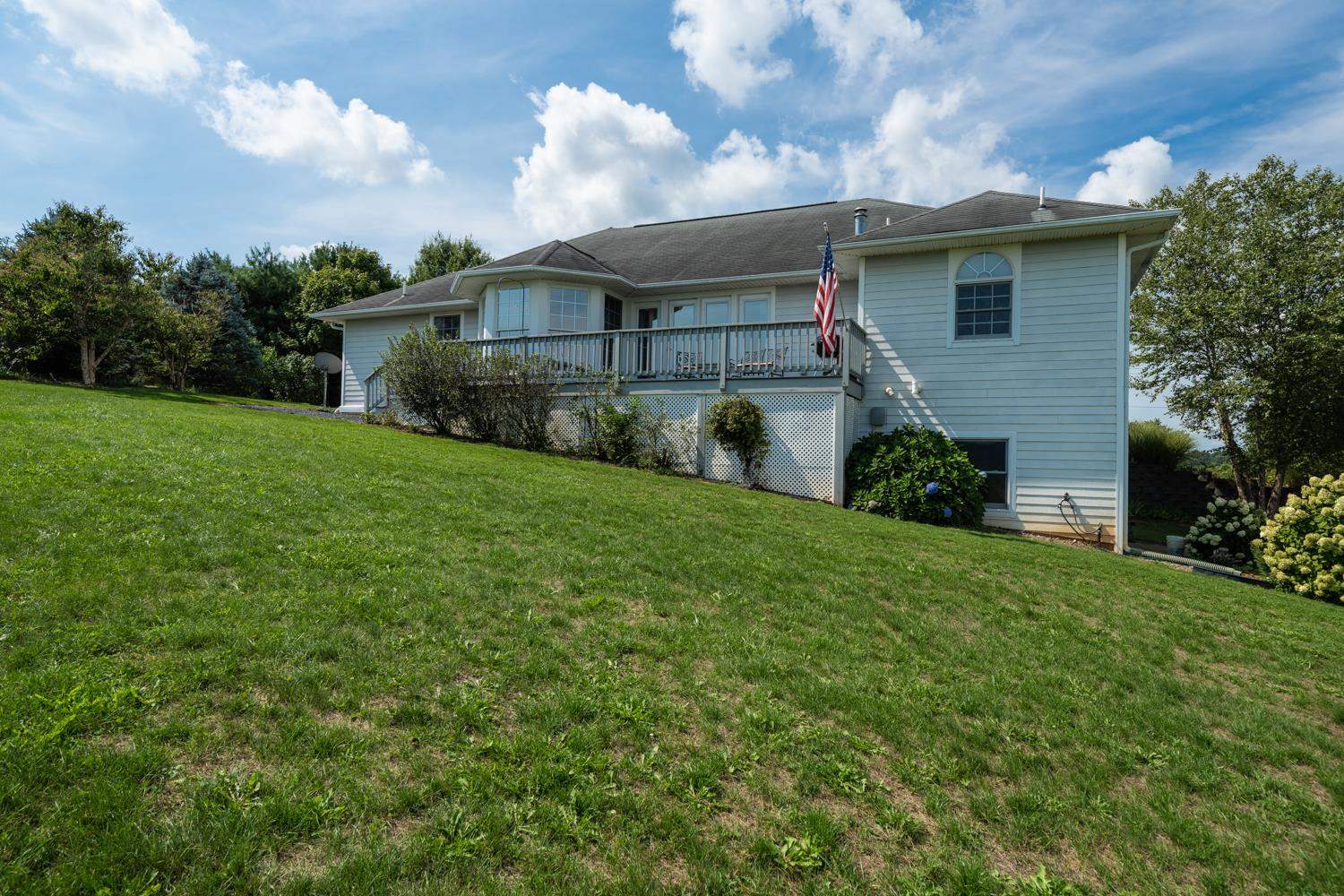 3751 Rockfish Road Grottoes, VA 24441 - Photo 44 of 60 a front view of a house with garden