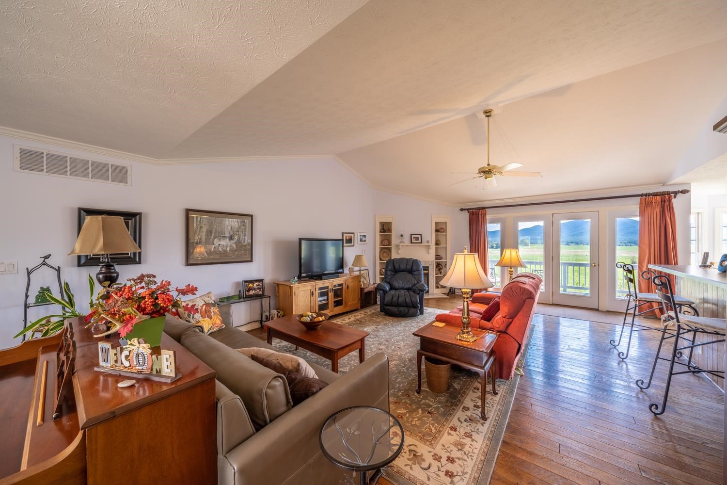 3751 Rockfish Road Grottoes, VA 24441 - Photo 5 of 60 a living room with furniture and a flat screen tv