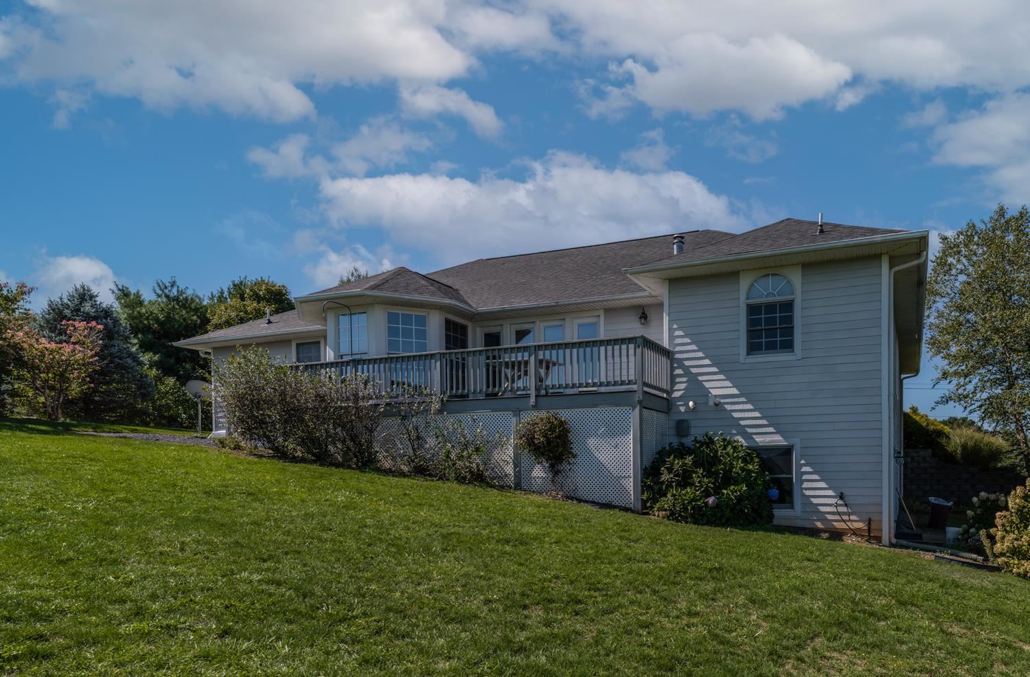 3751 Rockfish Road Grottoes, VA 24441 - Photo 54 of 60 a front view of house with yard and green space