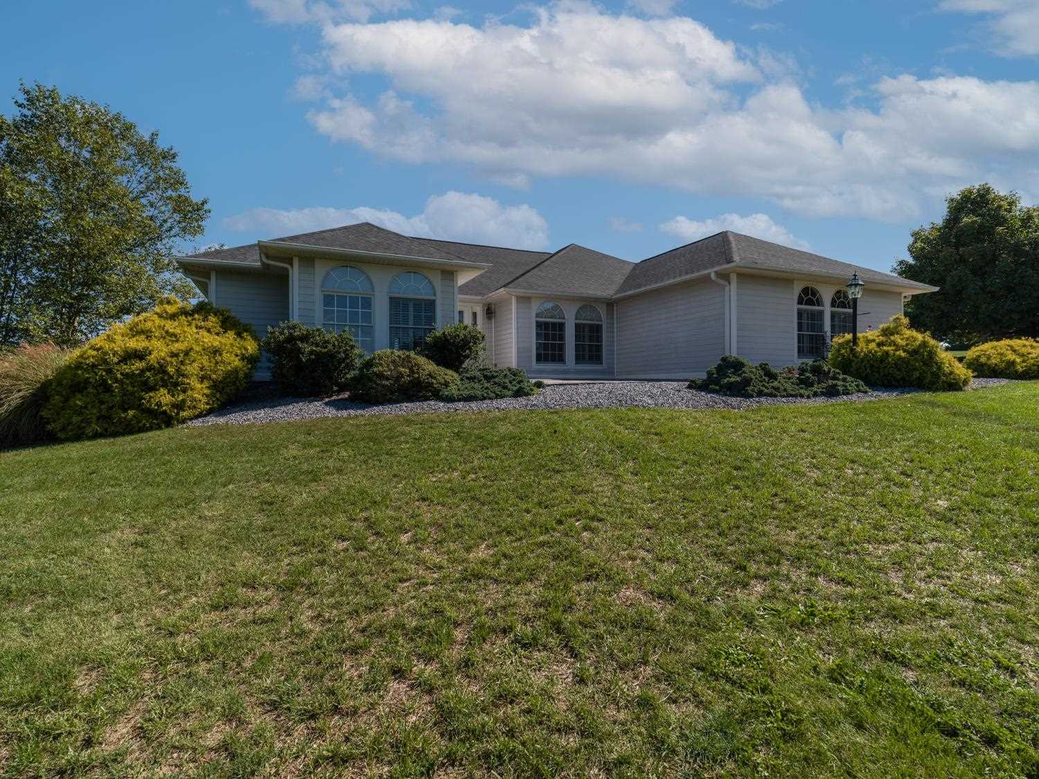 3751 Rockfish Road Grottoes, VA 24441 - Photo 56 of 60 a front view of a house with a yard