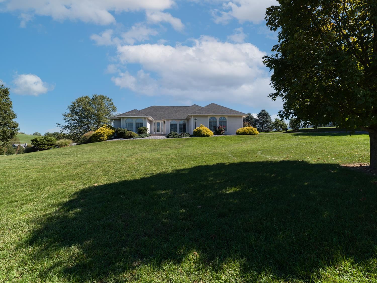 3751 Rockfish Road Grottoes, VA 24441 - Photo 57 of 60 a view of a big yard with plants and large trees
