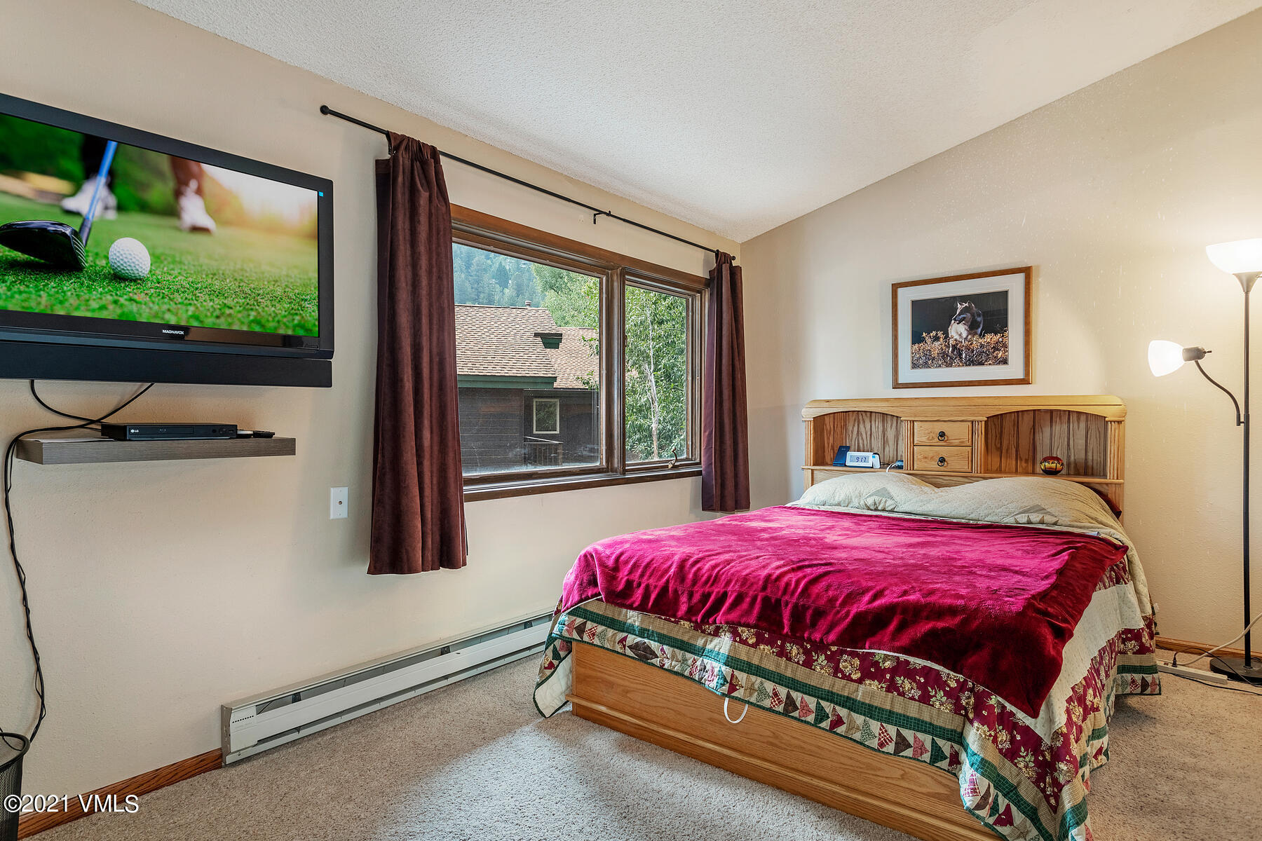 225 Gopher Road, Unit 46 Avon, CO 81620 - Photo 15 of 34 a bedroom with a bed and a window