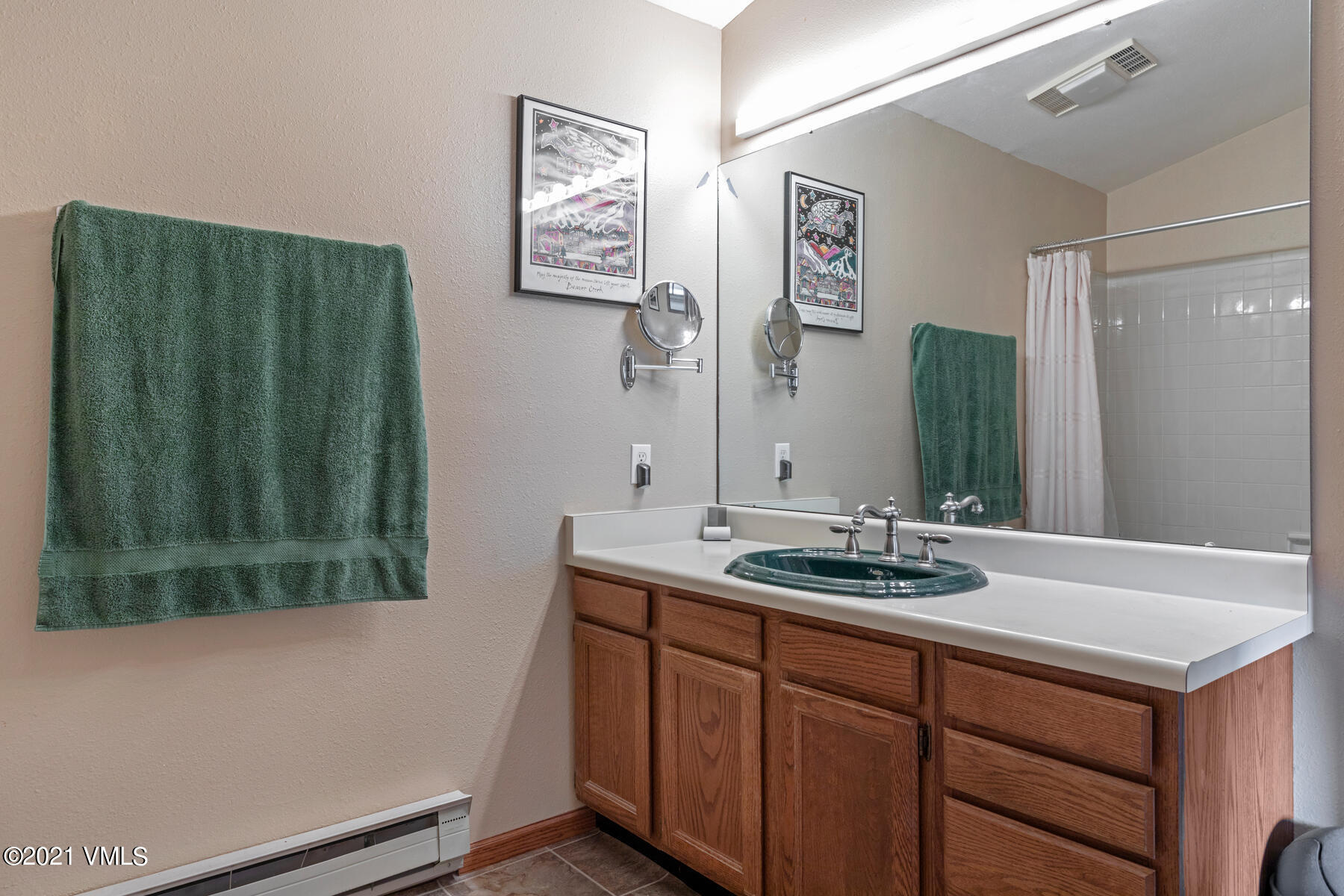 225 Gopher Road, Unit 46 Avon, CO 81620 - Photo 20 of 34 a bathroom with a sink and a mirror