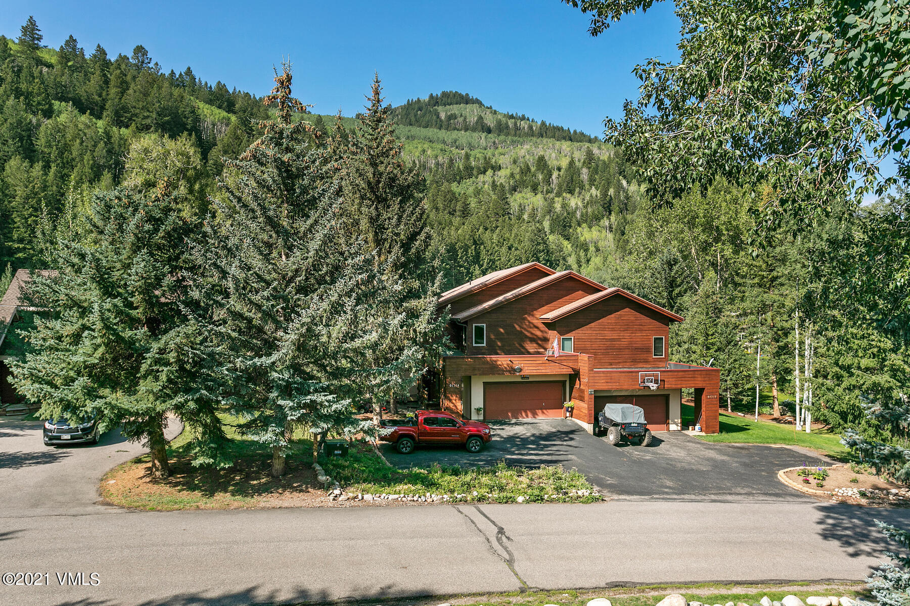 225 Gopher Road, Unit 46 Avon, CO 81620 - Photo 2 of 34 a front view of a house with a yard