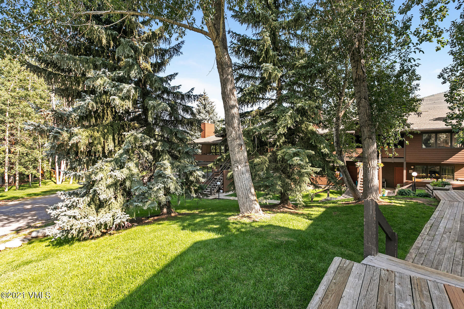 225 Gopher Road, Unit 46 Avon, CO 81620 - Photo 25 of 34 a view of backyard with swimming pool