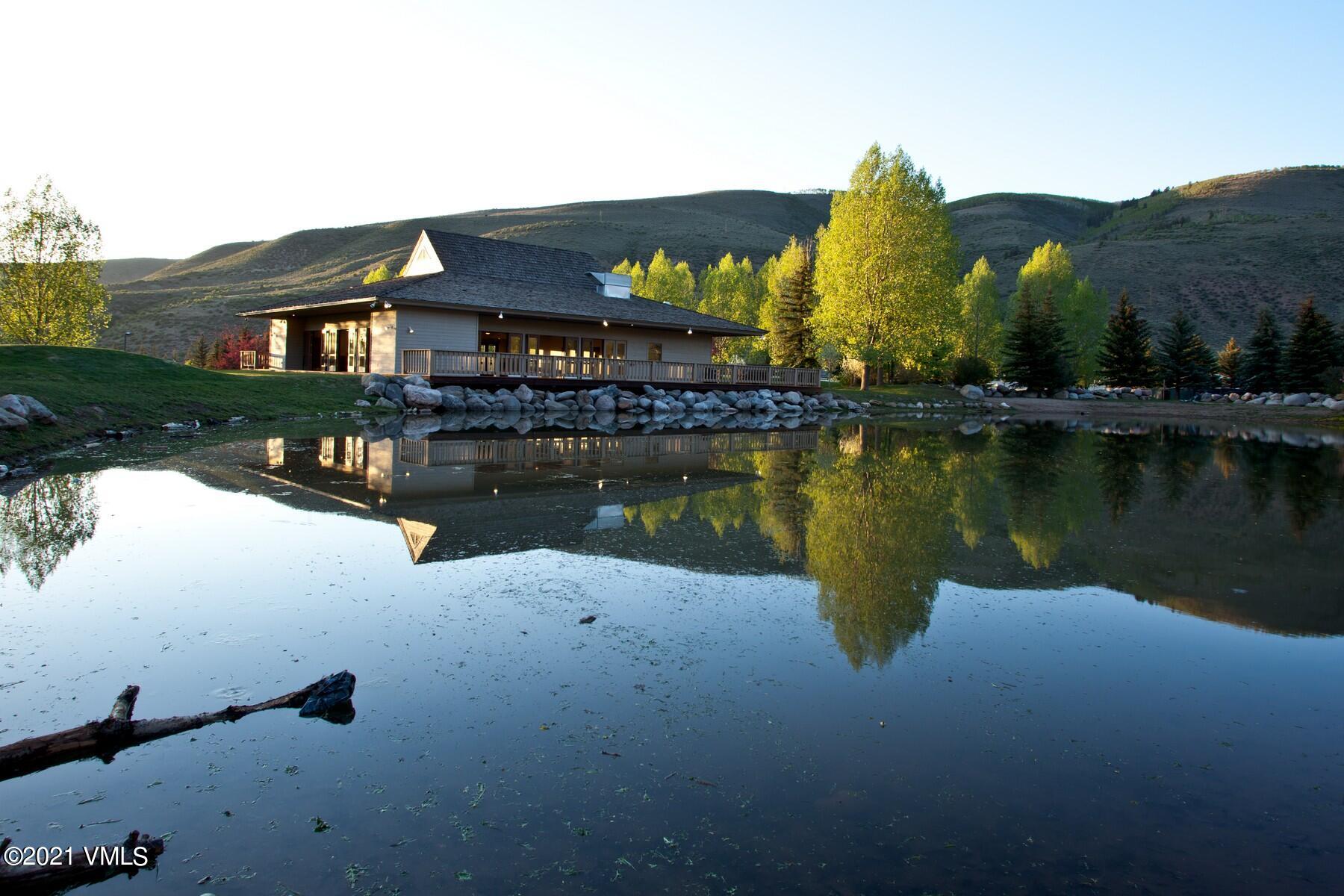 225 Gopher Road, Unit 46 Avon, CO 81620 - Photo 27 of 34 a view of a lake in front of house