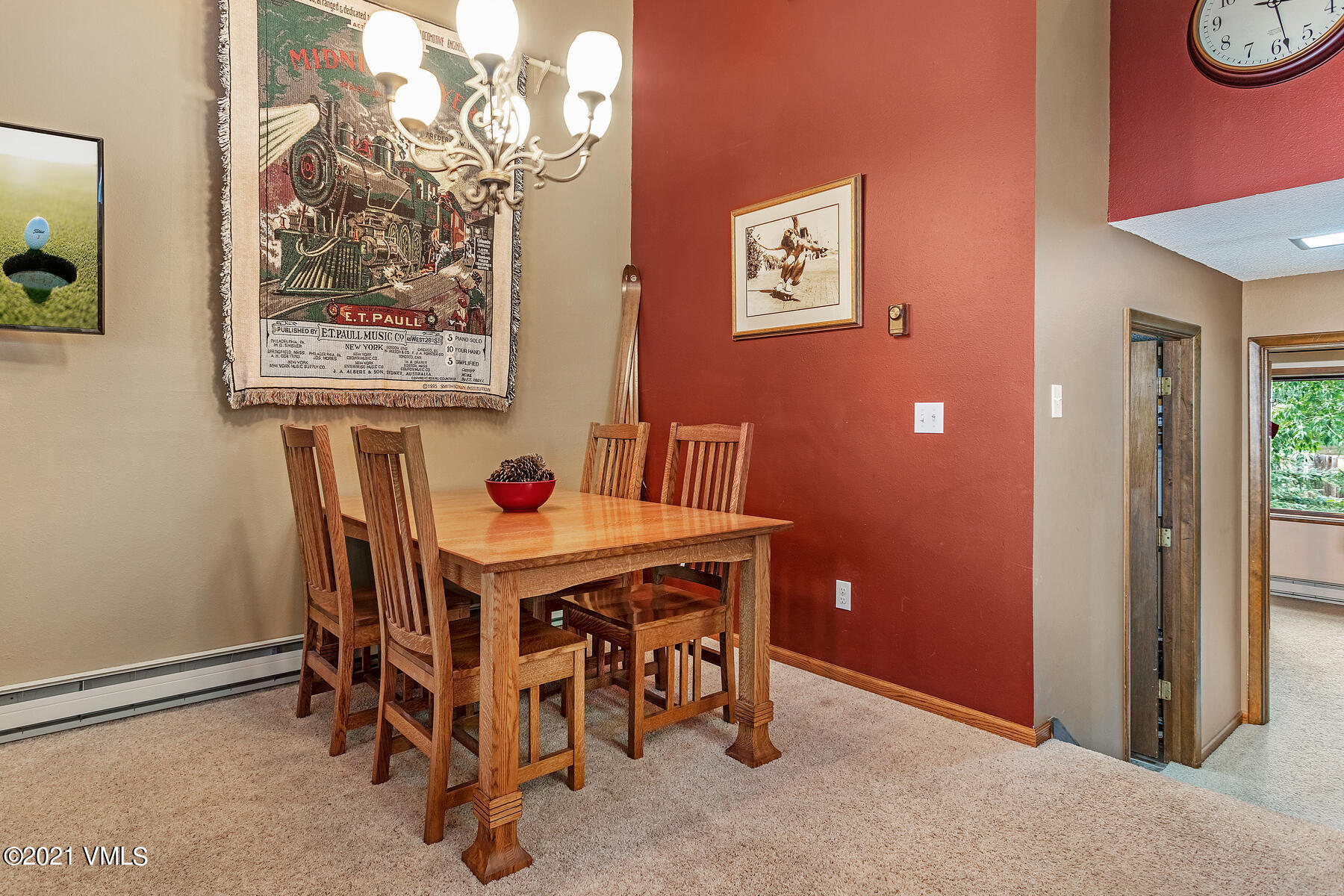 225 Gopher Road, Unit 46 Avon, CO 81620 - Photo 10 of 34 a view of a dining room with furniture and a chandelier