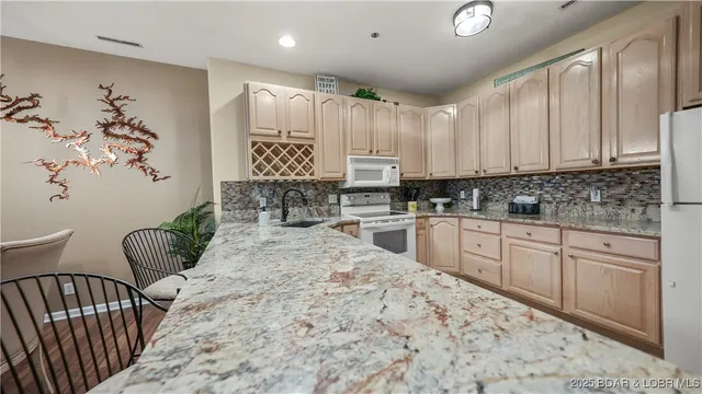$485,000 | 611 Lazy Days Road, Unit I 1B, Osage Beach, MO 65065