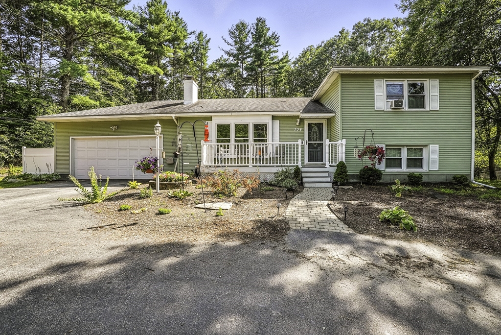 a front view of a house with patio