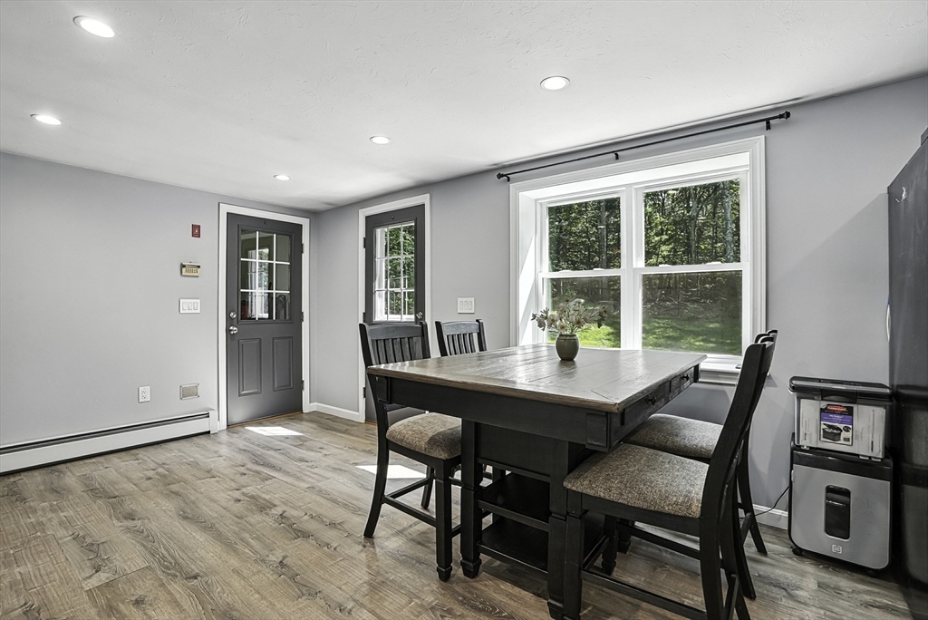 334 Mendon Road Northbridge, MA 01534 - Photo 12 of 31 a view of a dining room with furniture window and outside view