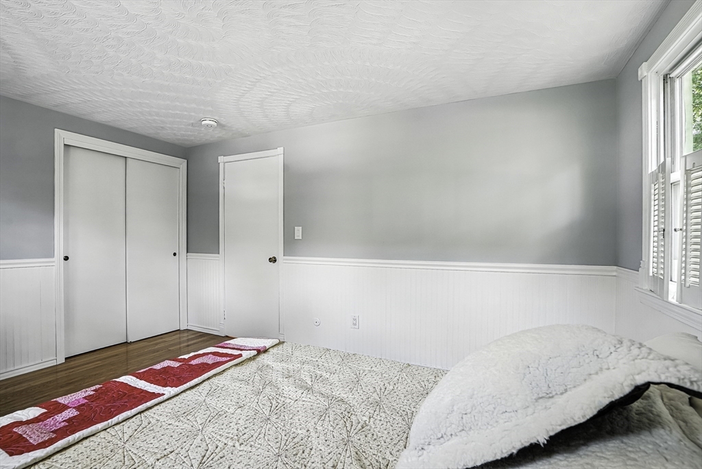 334 Mendon Road Northbridge, MA 01534 - Photo 18 of 31 a bedroom with a bed and a window