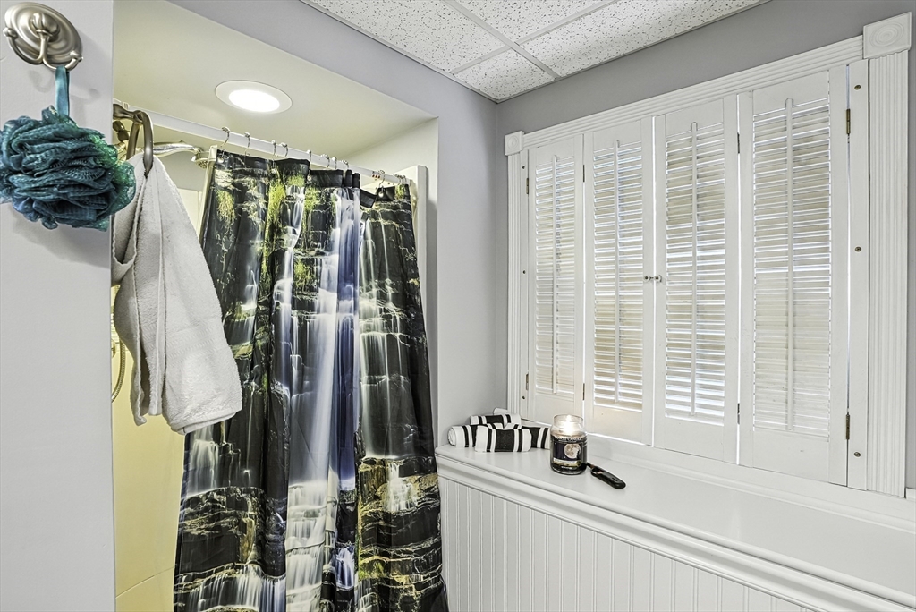 334 Mendon Road Northbridge, MA 01534 - Photo 23 of 31 a bathroom with a bathtub and shower