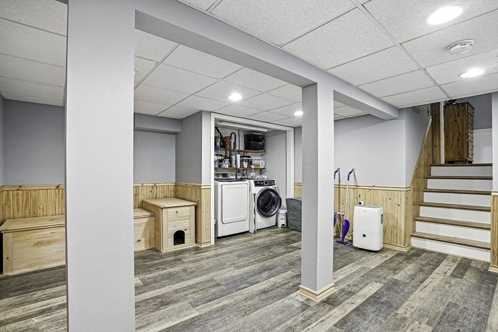 334 Mendon Road Northbridge, MA 01534 - Photo 27 of 31 a view of a livingroom with wooden floor and white walls